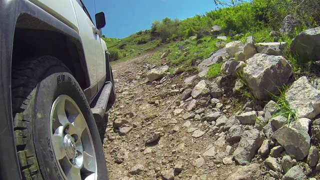 Extreme riding with jeep on a very bad rocky road