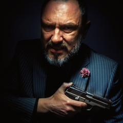 Man And Silver Gun