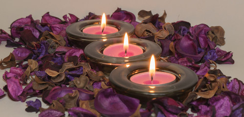 Obraz na płótnie Canvas Decorations, purple potpourri with candles, romance