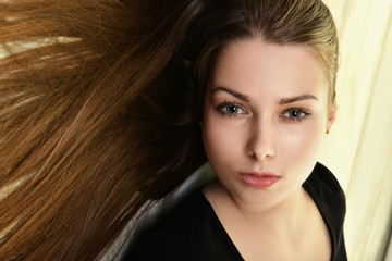 Beautiful woman with long brunette hair. 