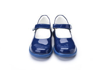 blue patent childrens shoe on a white background