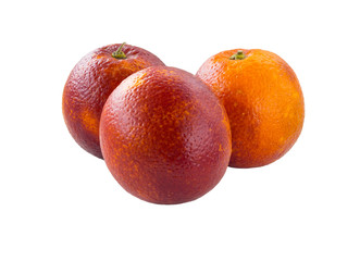 Three colorful red sicilian oranges isolated on white