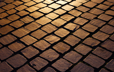 old town paving slabs at sunset