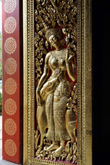 Door's relief of Wat Xieng Thong, Luang Prabang, Laos