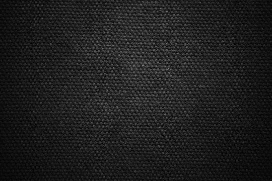 Textured fabric jeans. Dark background texture. Blank for design