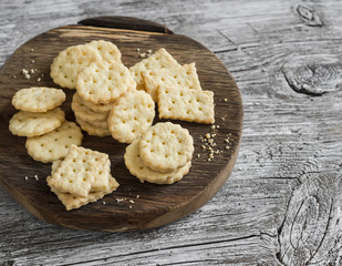 Homemade cheese cookies on a wooden rustic background