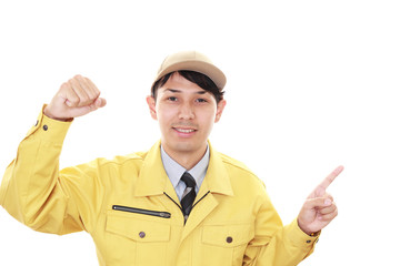 ガッツポーズの作業員