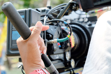 Obraz premium Cameraman at work,Professional digital video camera