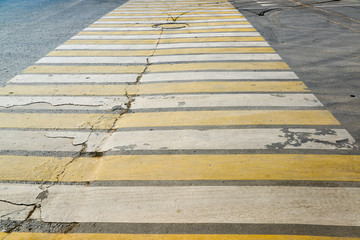 White and yellow stripes on  pedestrian crossing