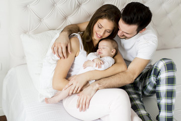 Happy family with newborn baby