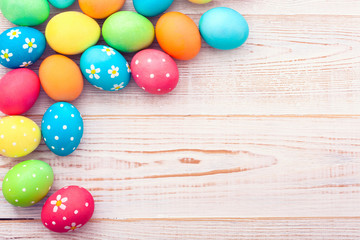 Easter background. Colorful easter eggs with pattern flowers. Top view, horizontal. Poster, mock up for design. Selective focus