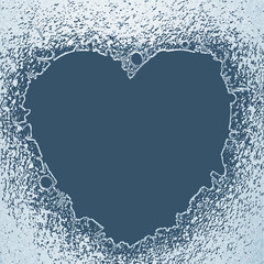 Broken glass. Hole in the shape of heart in ice