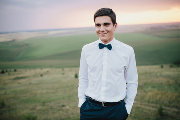 Wedding. Groom posing.