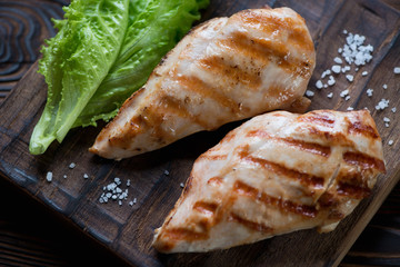 Close-up of grilled chicken breast filets, selective focus