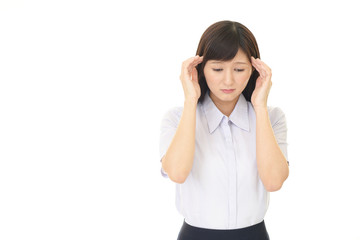 頭痛を訴える女性