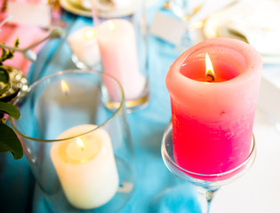 Table decoration with flowers and candle