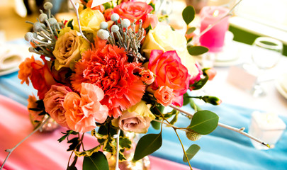 Table decoration with flowers and candle