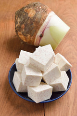 Taro on wood table background