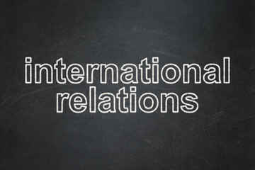 Obraz premium Politics concept: International Relations on chalkboard background