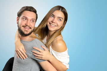 Cheerful young couple standing