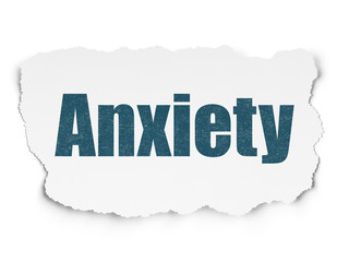 Healthcare concept: Anxiety on Torn Paper background