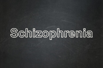 Obraz premium Healthcare concept: Schizophrenia on chalkboard background