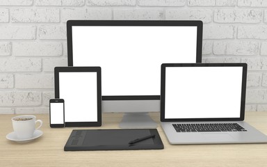 Responsive mockup screen. Monitor, laptop, tablet, phone on table in office.