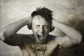 Teen boy screaming