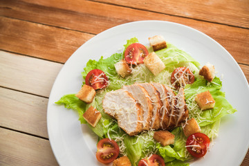 tasty dinner with cesar salad