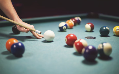 Table full of colorful cue balls