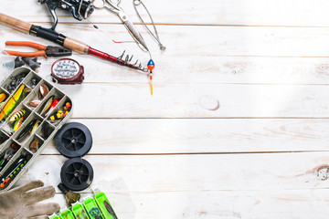 Various fisherman's equipment on wooden background © fotofabrika