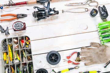 Various fisherman's equipment on wooden background © fotofabrika