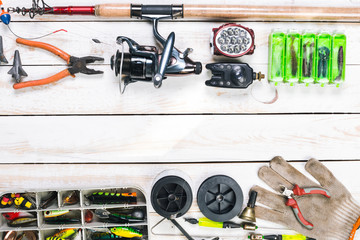 Various fisherman's equipment on wooden background © fotofabrika