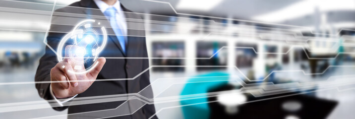 Businessman using digital tactile screen interface