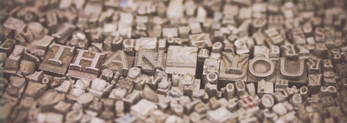 Close up of typeset letters with the words Thank You