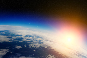 Sunrise over planet Earth in space - obrazy, fototapety, plakaty