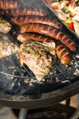 barbecue with delicious grilled meat on grill