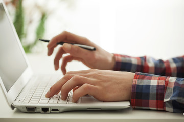 Fototapeta premium Hands on keyboard