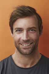 Fototapeta premium Handsome man smiling at camera