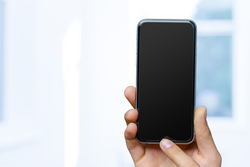 Close up of man using mobile smart phone