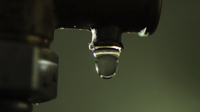 Drop Drips From a Pipe Tube