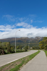 summer landscape, the Jura France. Ain region on the border with Geneva. landscape with country road.