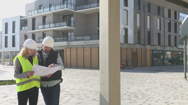View of a Worker and enginner checking last details before delivery