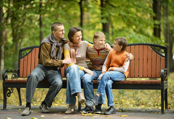 Family of four sitting