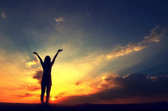 Silhouette, Free Happy Woman Relaxing Nature sky and sunset. Outdoor. Freedom concept.