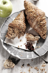 Croissant breakfast with jam