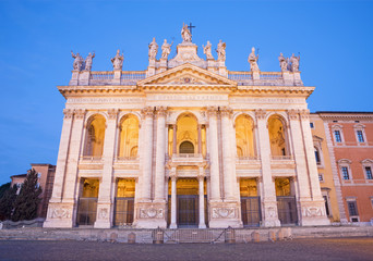 Rome - The facade of St. John Lateran basilica (Basilica di San Giovanni in Laterano) at dusk