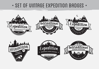 Fototapeta premium Set of mountain adventure and travel emblems. Exploration vector badges.