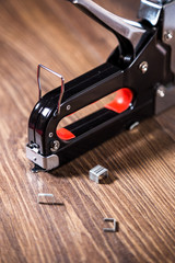 Stapler and staples for carpenters