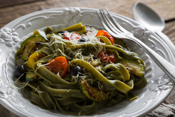 Pasta with zucchini cherry tomatoes and cheese